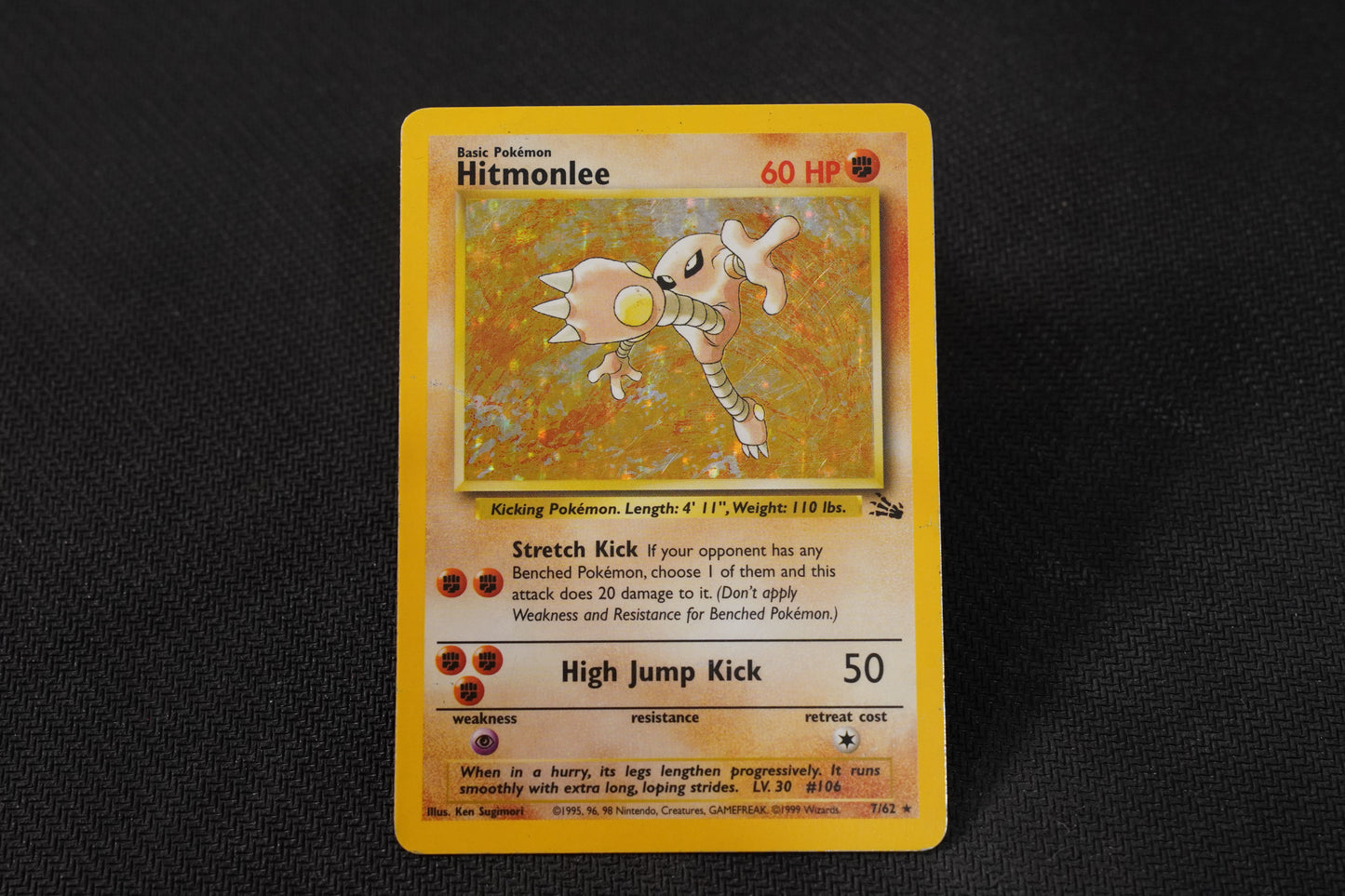 Hitmonlee 7/62 Fossil Unlimited Holo TCG Pokémon Card - Heavily Played/D (Creased)