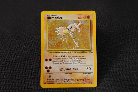 Hitmonlee 7/62 Fossil Unlimited Holo TCG Pokémon Card - Heavily Played/D (Creased)