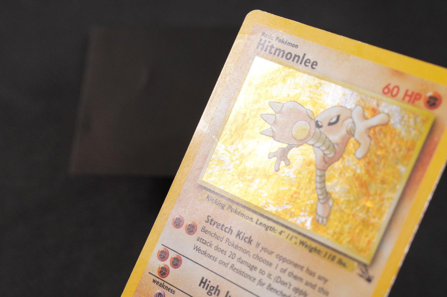 Hitmonlee 7/62 Fossil Unlimited Holo TCG Pokémon Card - Heavily Played/D (Creased)