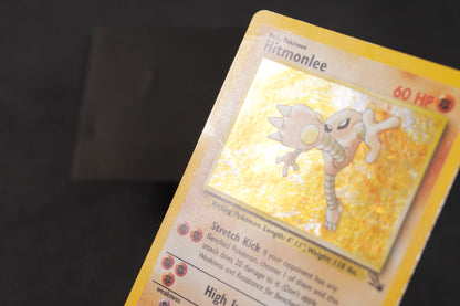 Hitmonlee 7/62 Fossil Unlimited Holo TCG Pokémon Card - Heavily Played/D (Creased)